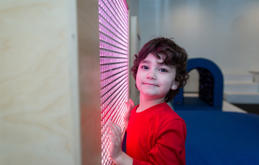 boy with light board