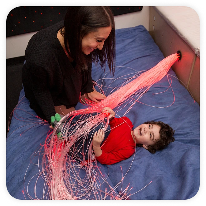 Kid laughing at Tallcot Center