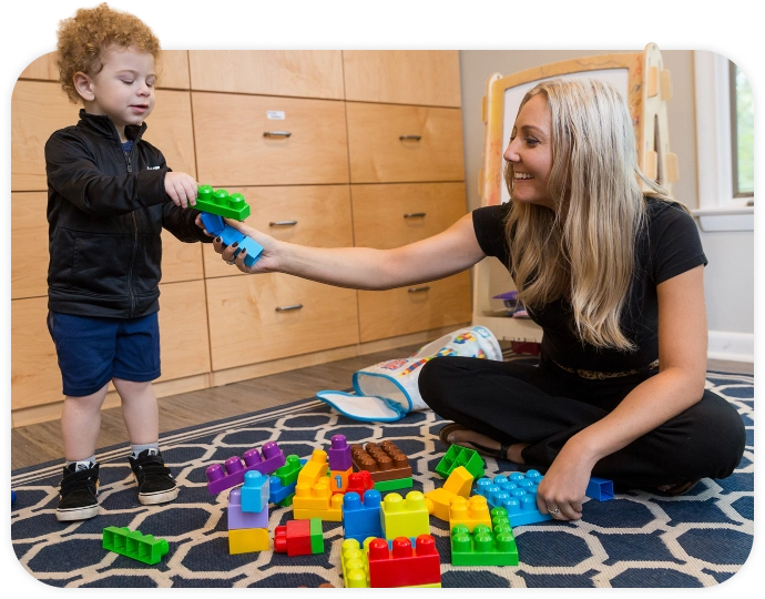 Woman playing with kid at Talcot Center