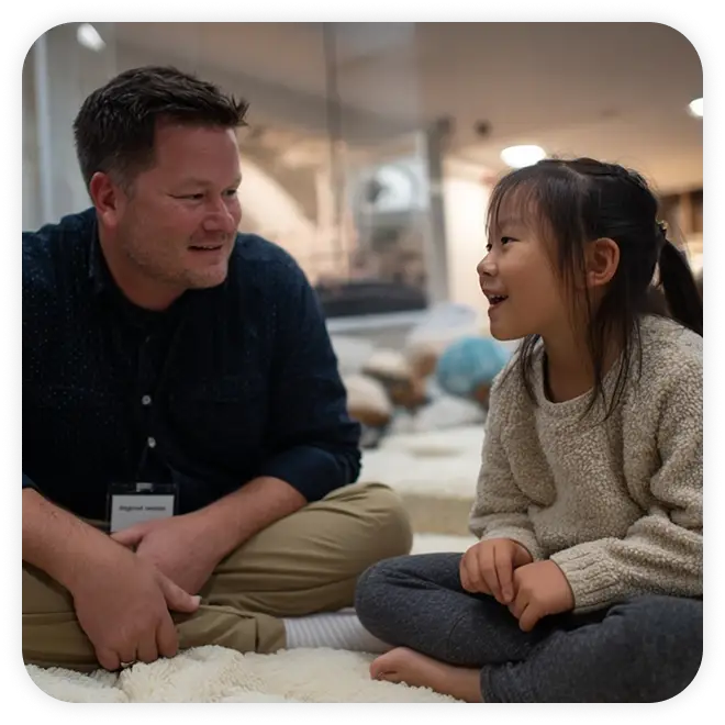 Asian kid with a male therapist